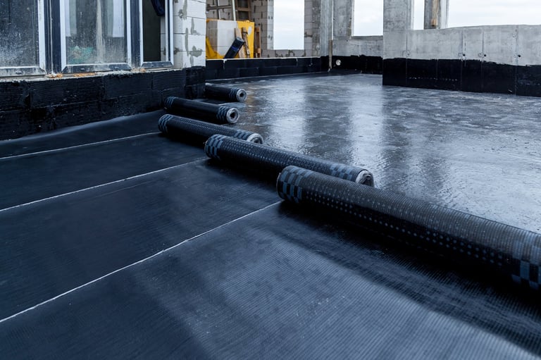 Laying and installation of roofing, bituminous waterproofing of an apartment building